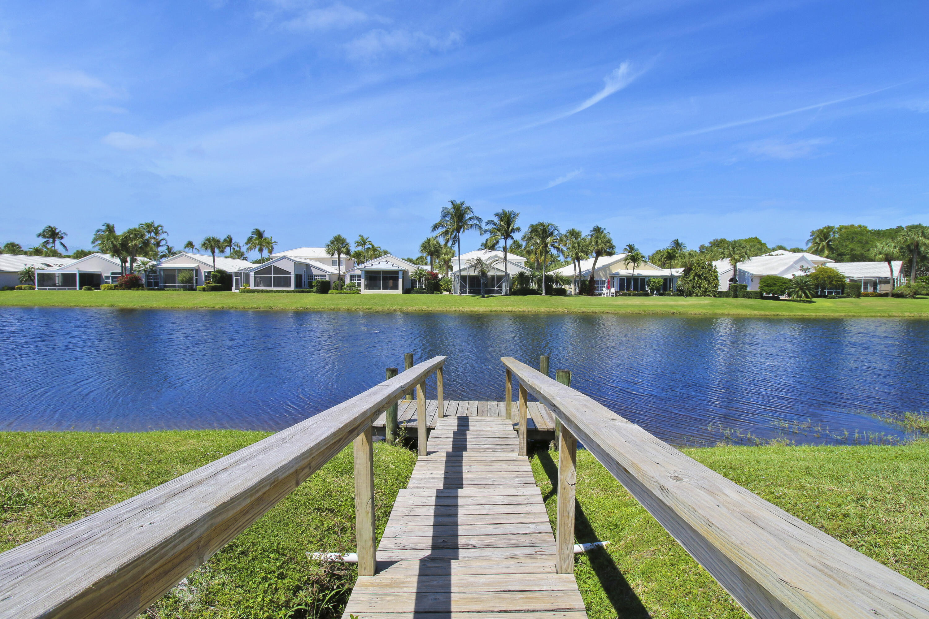 3703 Cape Pointe Circle Jupiter, FL 33477 - Photo 49 of 55 a view of a lake with outdoor space
