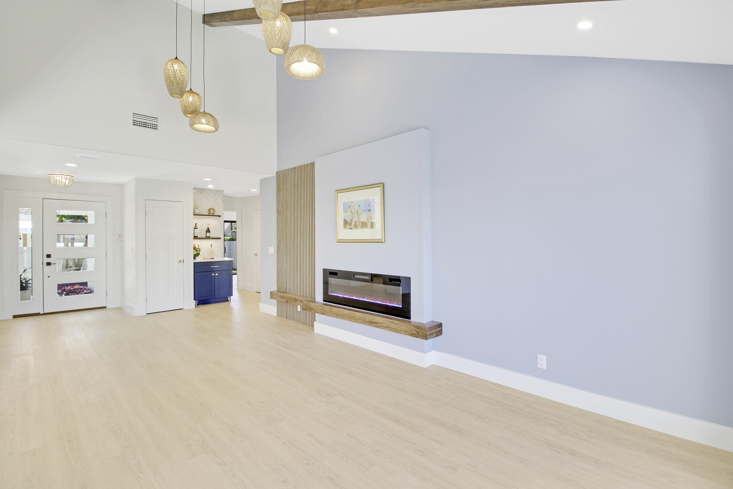 3703 Cape Pointe Circle Jupiter, FL 33477 - Photo 8 of 55 an empty room with windows and ceiling fan