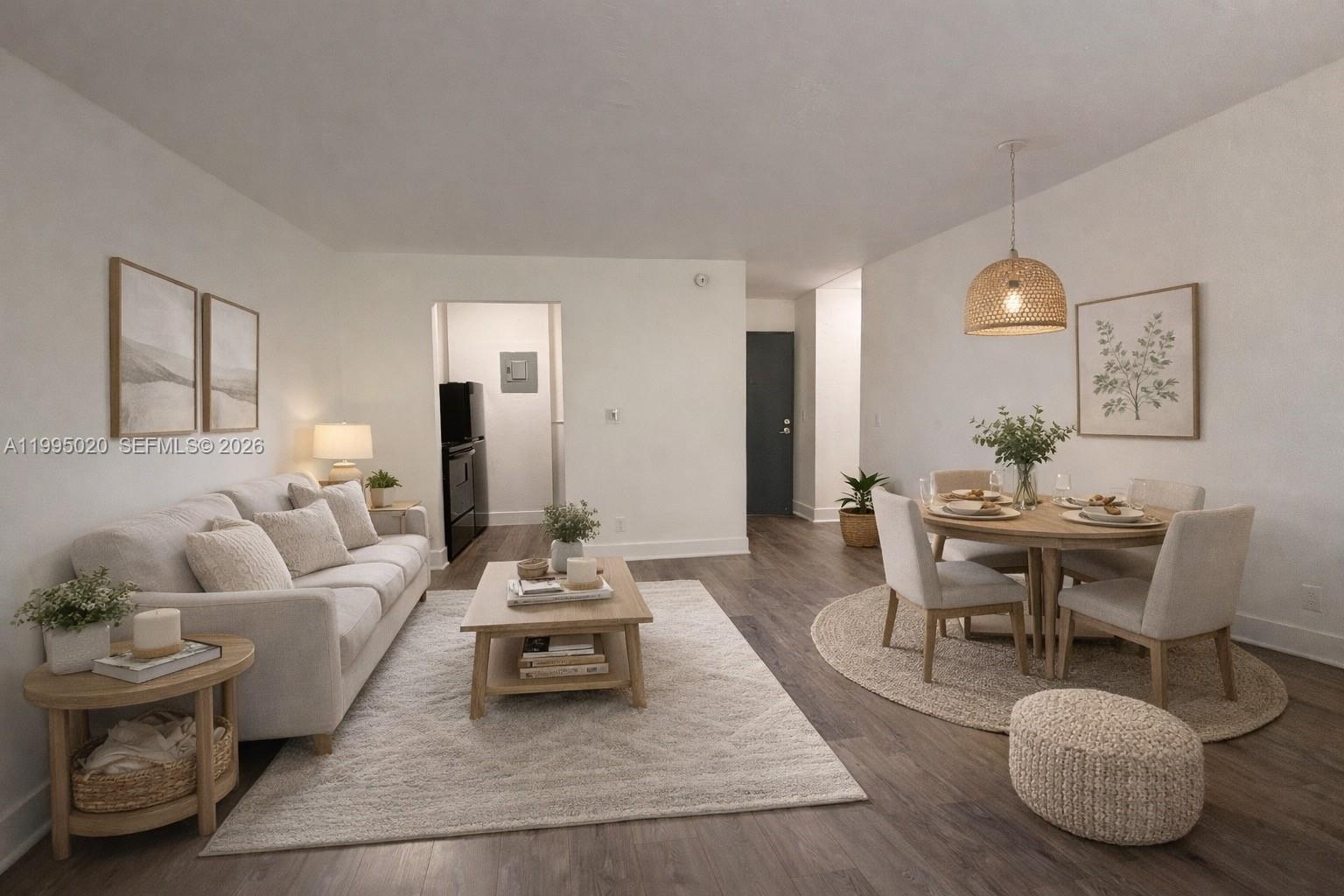 143 Southwest 9th Street, Unit 105 Miami, FL 33130 - Photo 6 of 20 a living room with furniture and a wooden floor