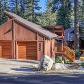 a backyard of a house with dishwasher and wooden floor