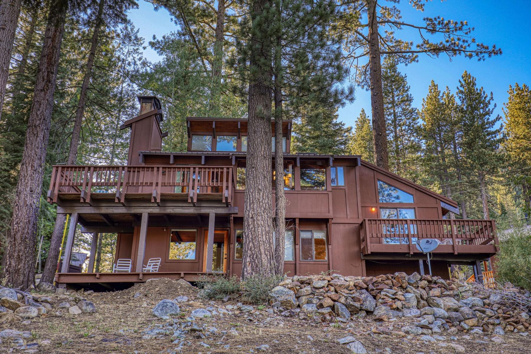 1469 Sandy Way Olympic Valley, CA 96146 - Photo 20 of 21 a house view with a sitting space and wooden fence