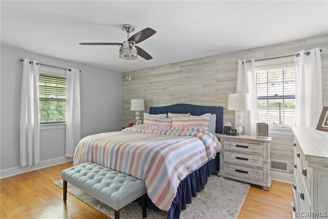 4430 Croatan Road Richmond, VA 23235 - Photo 23 of 44 a bedroom with a bed and a dresser next to a window