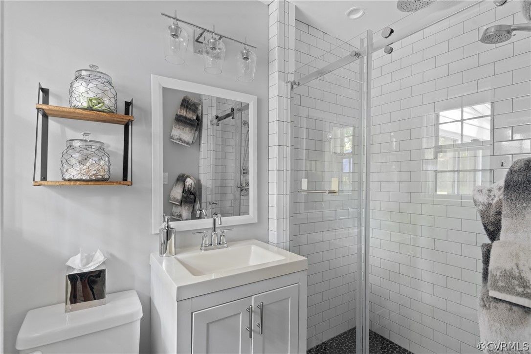 4430 Croatan Road Richmond, VA 23235 - Photo 25 of 44 a bathroom with a sink a toilet and shower