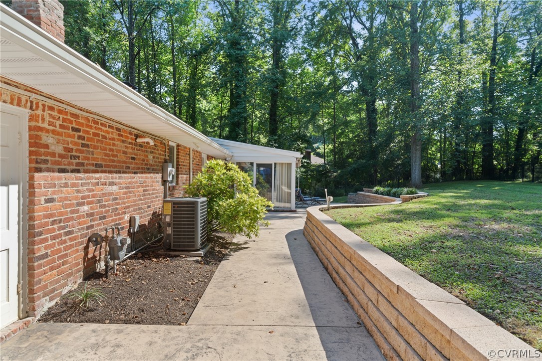 4430 Croatan Road Richmond, VA 23235 - Photo 31 of 44 a view of house with backyard space and garden