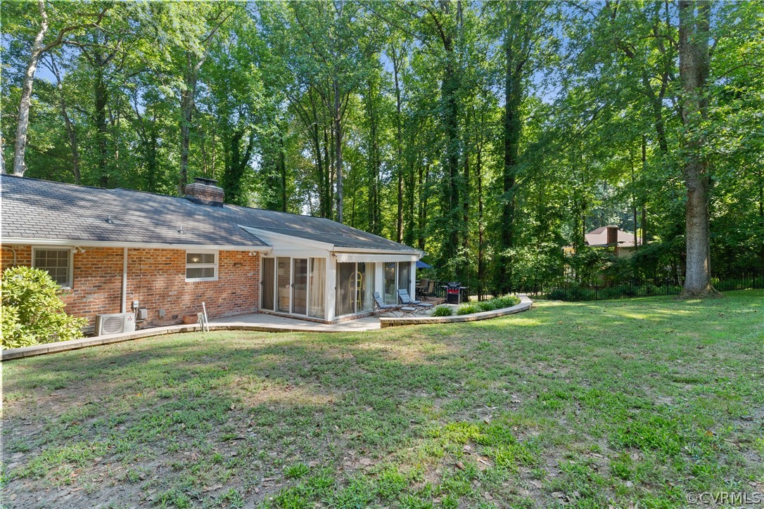 4430 Croatan Road Richmond, VA 23235 - Photo 38 of 44 a view of a house with a big yard and large trees