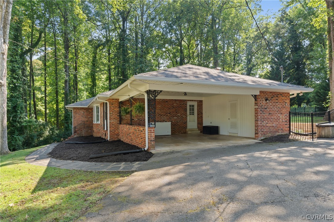 4430 Croatan Road Richmond, VA 23235 - Photo 39 of 44 a view of a house with a yard