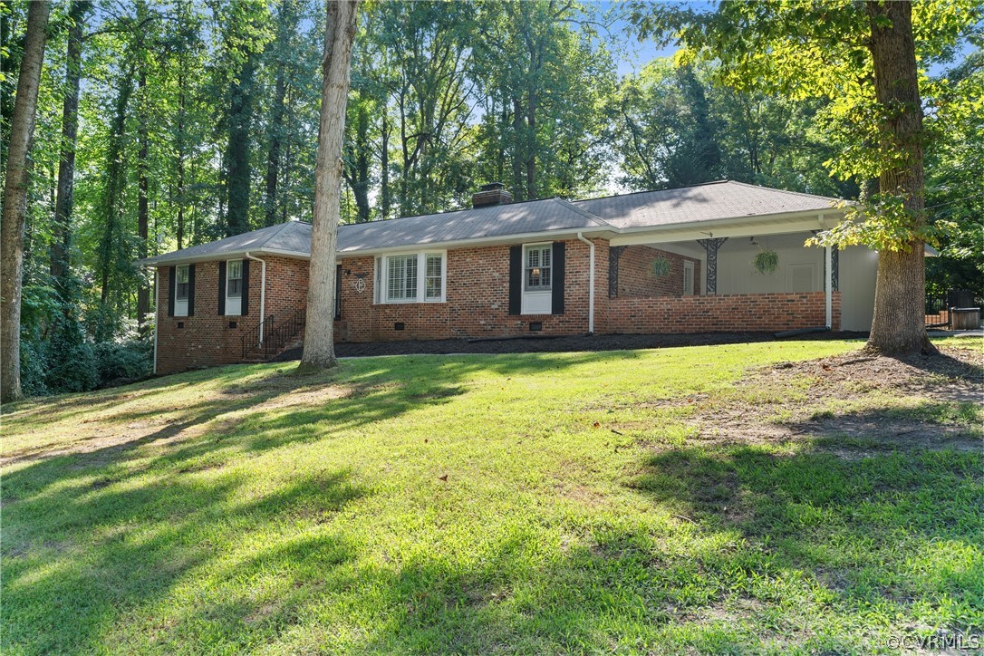4430 Croatan Road Richmond, VA 23235 - Photo 44 of 44 a view of a house with a yard