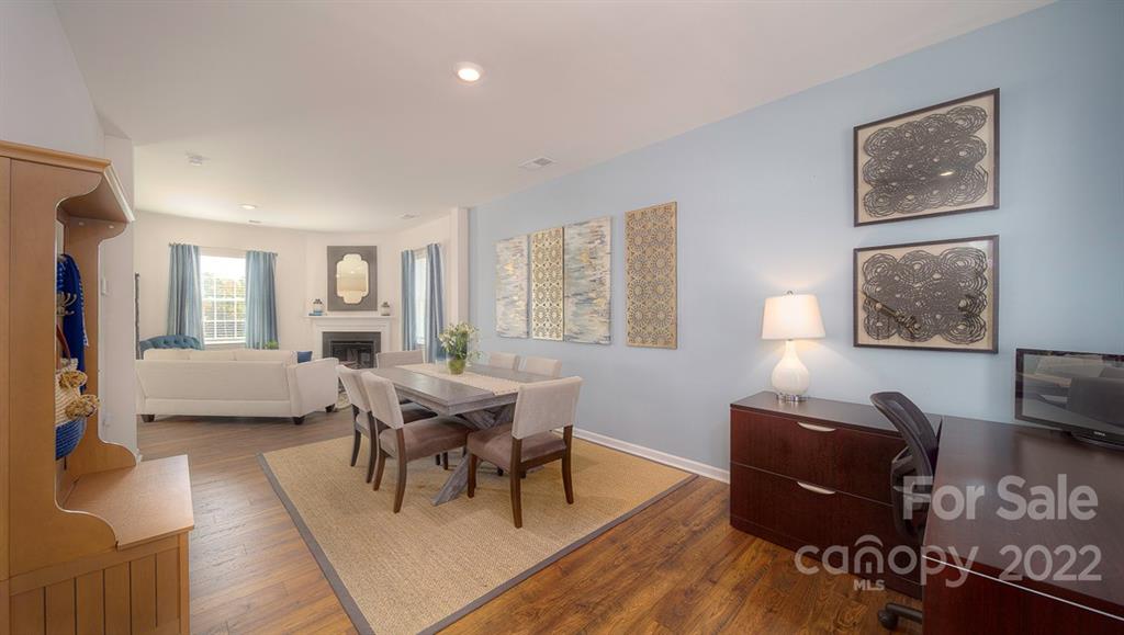 309 Gaines Road Clover, SC 29710 - Photo 13 of 48 a living room with furniture a large window and wooden floor