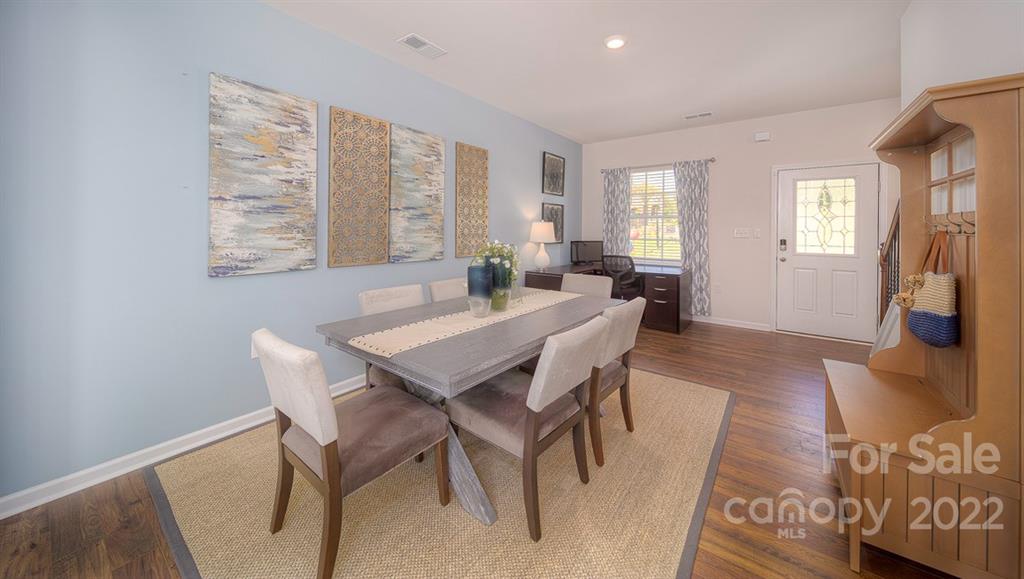 309 Gaines Road Clover, SC 29710 - Photo 14 of 48 a view of a dining room with furniture window and wooden floor