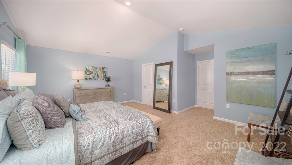 309 Gaines Road Clover, SC 29710 - Photo 32 of 48 a bedroom with a bed and a mirror