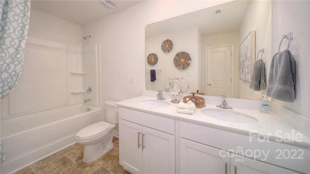 309 Gaines Road Clover, SC 29710 - Photo 40 of 48 a bathroom with a sink a toilet and a bathtub