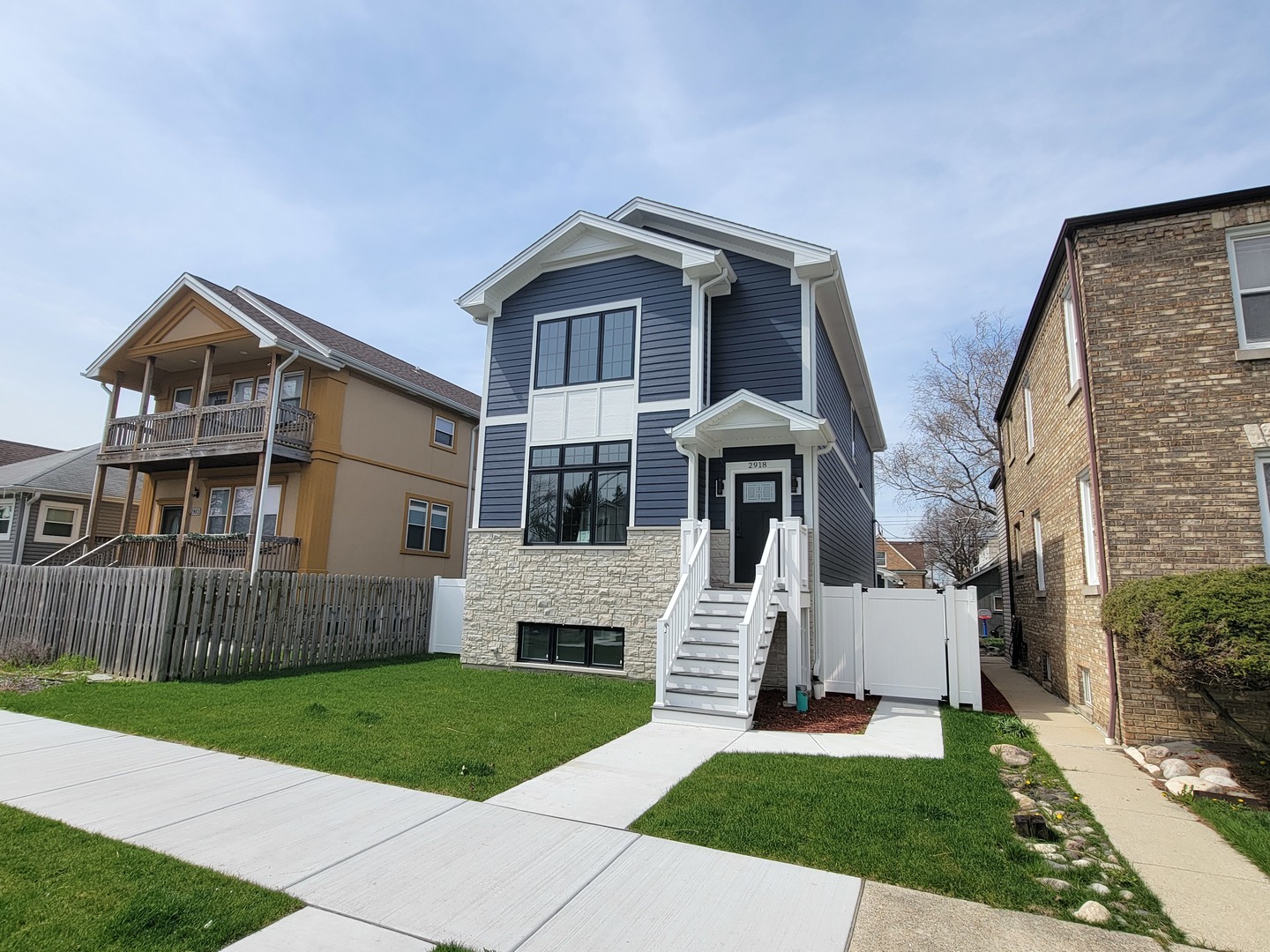 2918 North Rutherford Avenue Chicago, IL 60634 - Photo 1 of 18 a front view of house with yard and green space