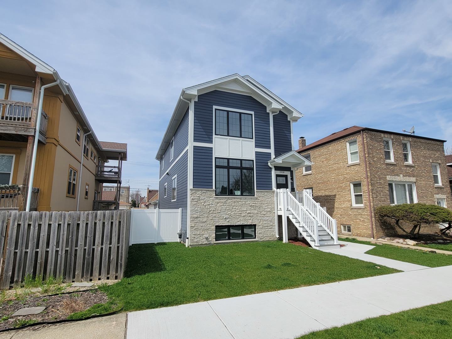 2918 North Rutherford Avenue Chicago, IL 60634 - Photo 18 of 18 a front view of a house with a yard