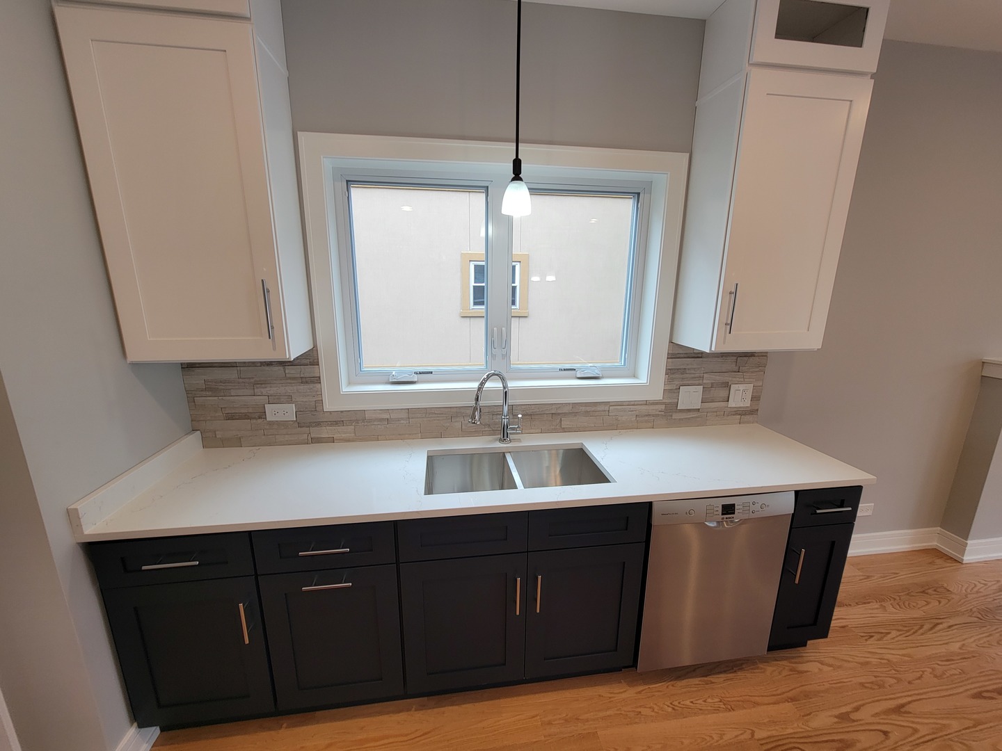 2918 North Rutherford Avenue Chicago, IL 60634 - Photo 8 of 18 a kitchen with a sink and cabinets