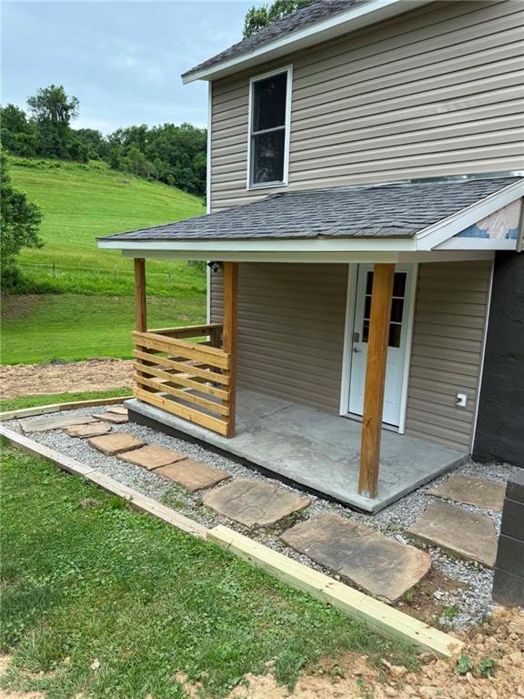 89 Old 51 Road Perryopolis, PA 15473 - Photo 30 of 45 a front view of a house with garden