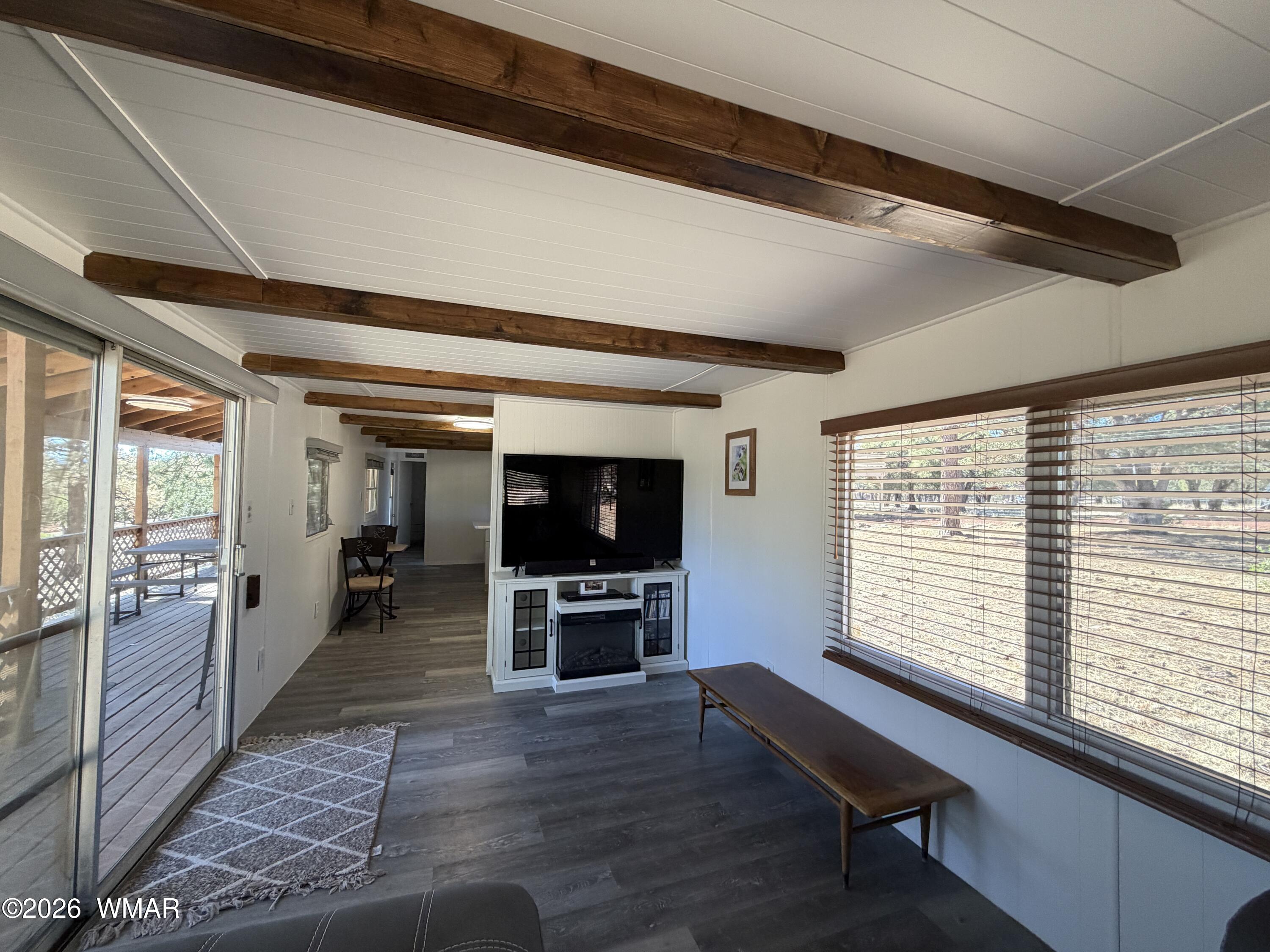 19 County Road Show Low, AZ 85901 - Photo 29 of 43 a livingroom with furniture window and wooden floor