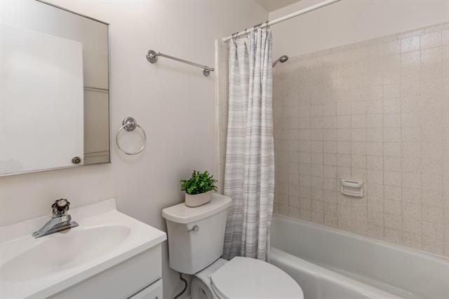317 Beach Drive Aptos, CA 95003 - Photo 31 of 41 a bathroom with a sink toilet and shower