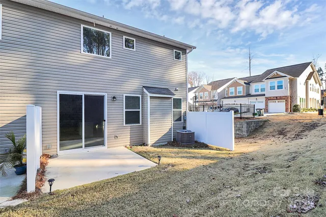 a view of a backyard of the house