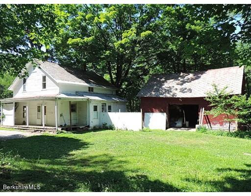 a front view of house with yard