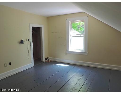 45 Bray Road Shelburne Falls, MA 01370 - Photo 12 of 18 an empty room with wooden floor and windows