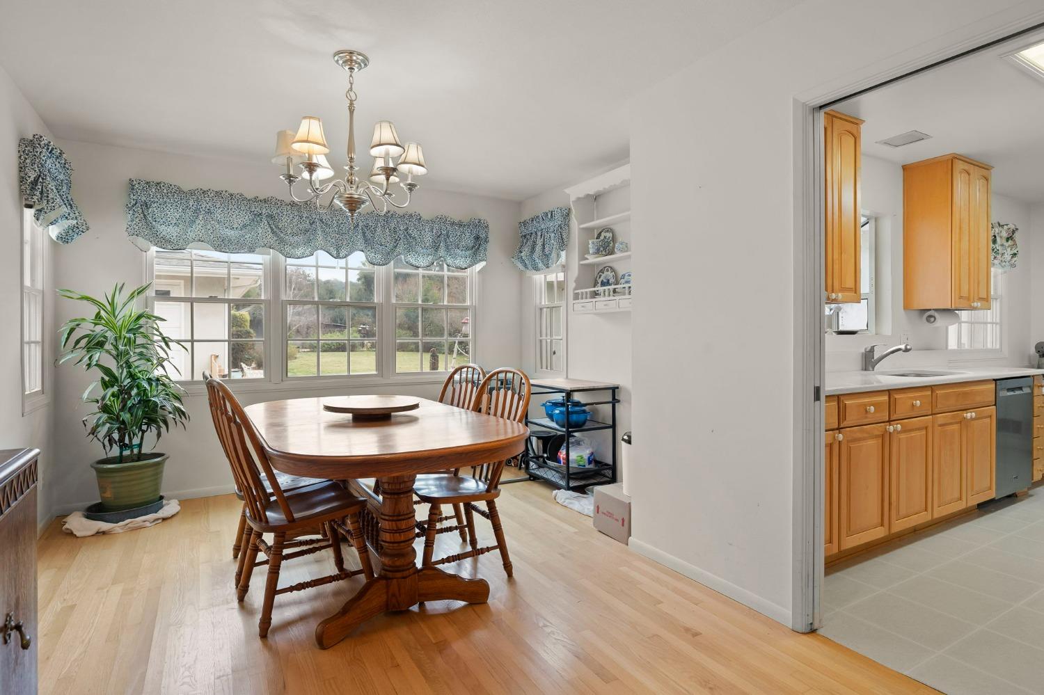 1928 South Rice Road Ojai, CA 93023 - Photo 6 of 41 a view of a dining room with furniture window and wooden floor