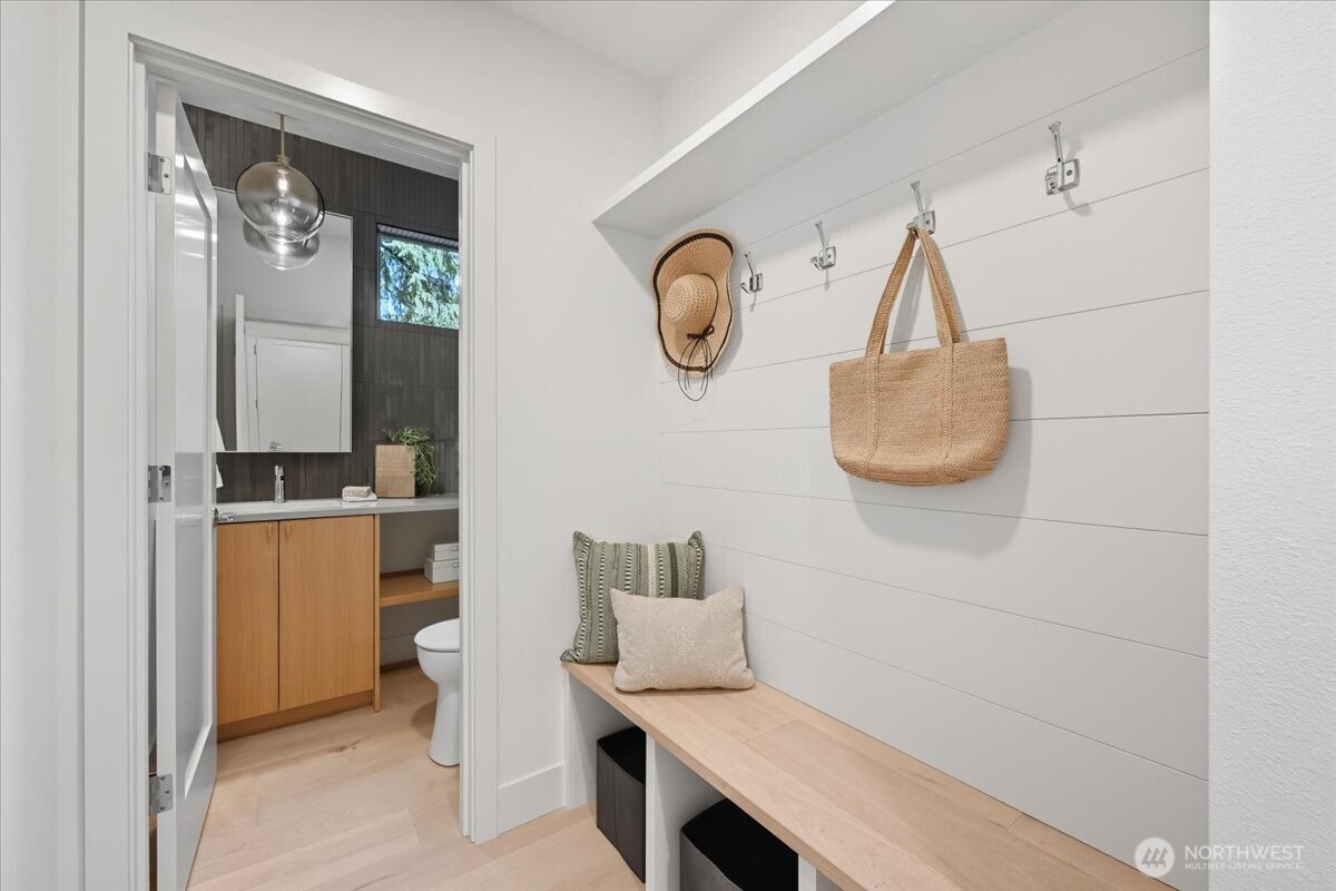 13047 39th Avenue Northeast, Unit A Seattle, WA 98125 - Photo 6 of 23 a bathroom with a sink and a mirror