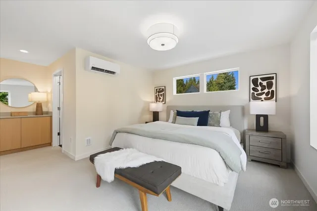 a bedroom with a bed and a view of bathroom