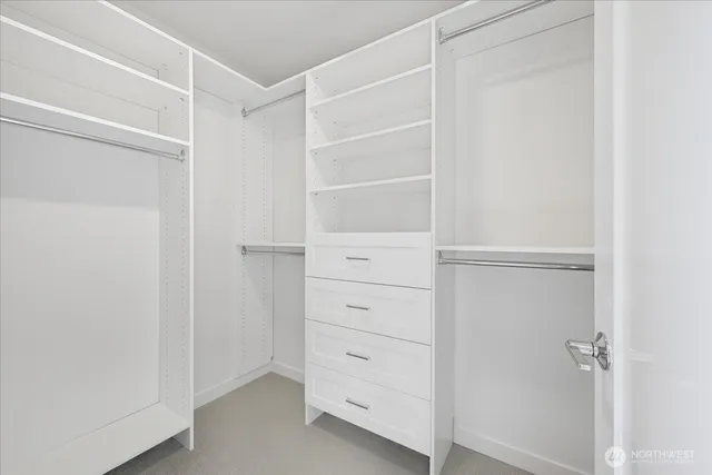a view of an empty walk in closet