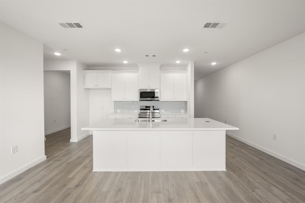 4611 Hawks Trail Oak Point, TX 75068 - Photo 6 of 40 4611 Haws Trail_ 2570_Lotus- Kitchen-2