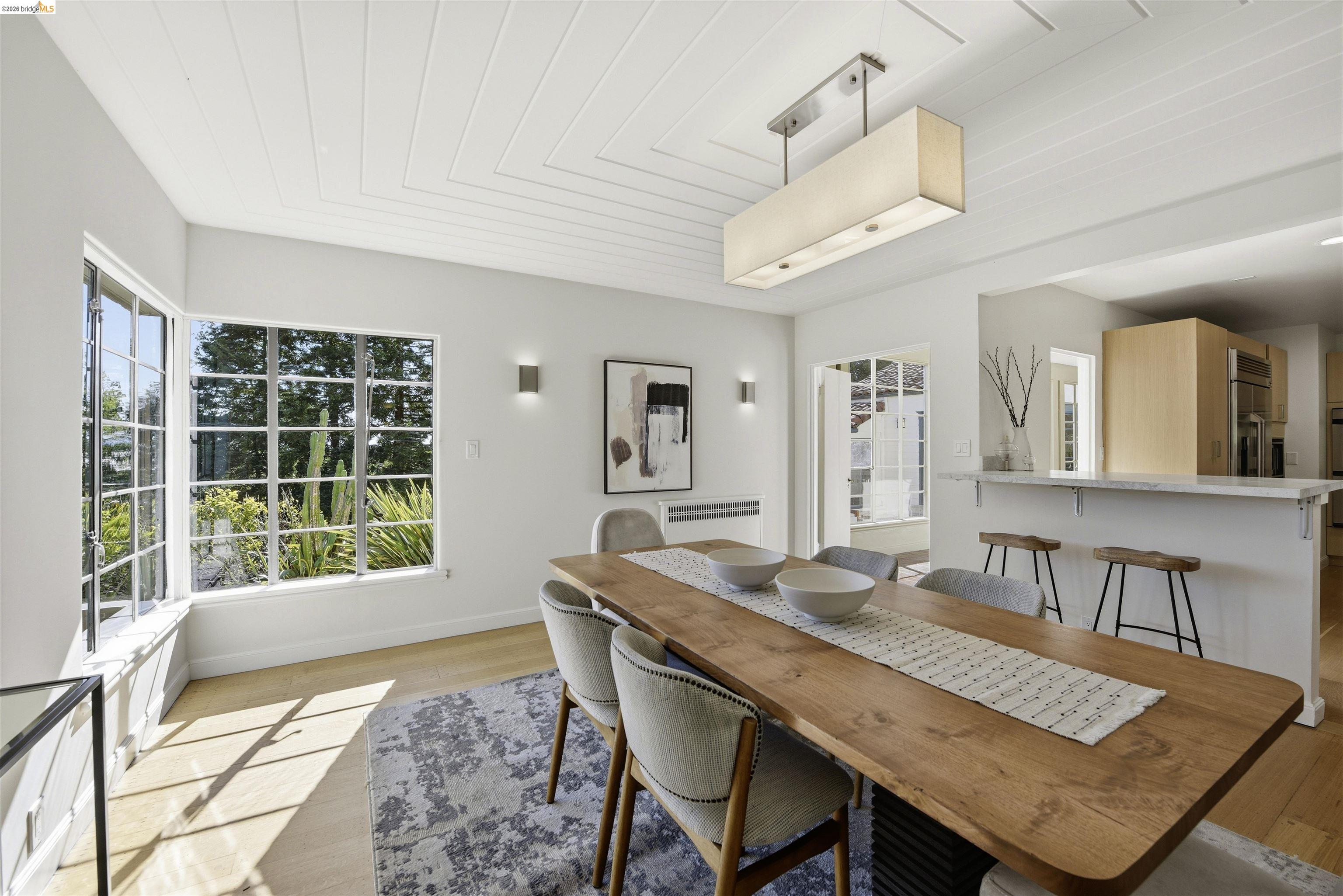 44 Highgate Road Kensington, CA 94707 - Photo 22 of 83 a view of a dining room with furniture and a large window