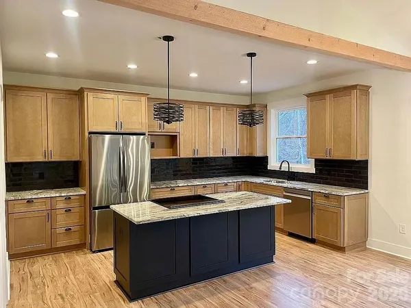 a view of a kitchen from a window