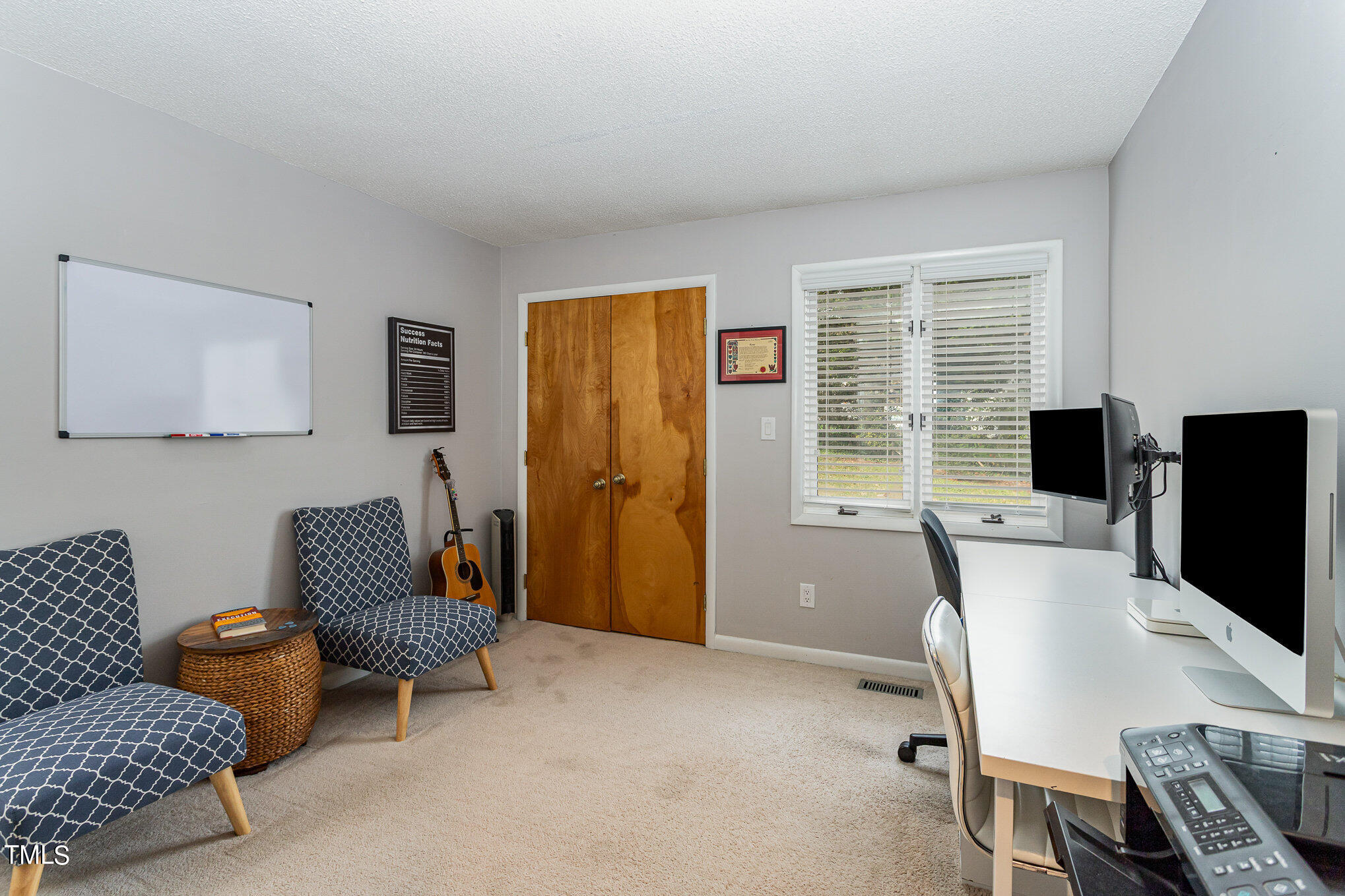 6913 Three Bridges Circle Raleigh, NC 27613 - Photo 24 of 28 a workspace with furniture and a window