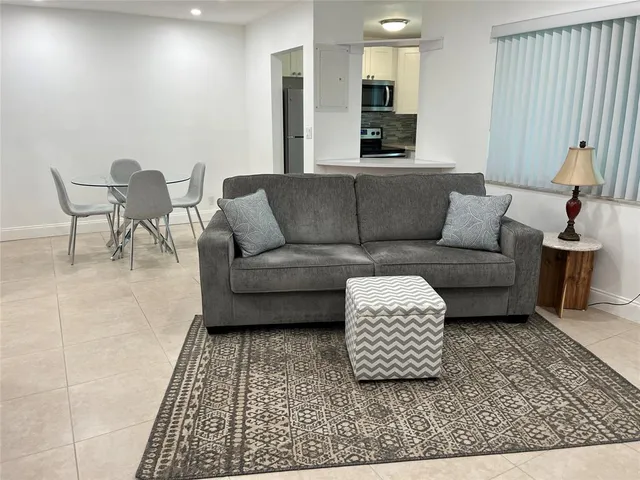 a living room with furniture and a couch