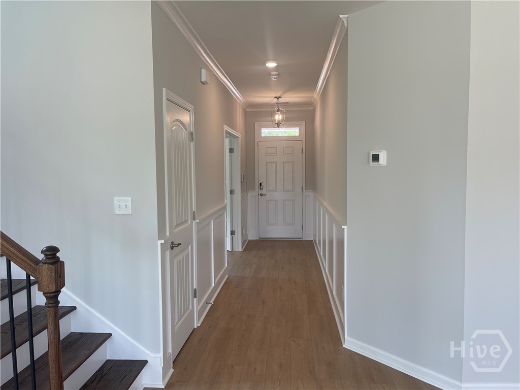 193 Champlain Drive Pooler, GA 31322 - Photo 3 of 19 Wide Foyer with Wainscotting and Crown