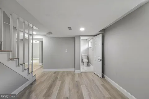 a view of entryway with wooden floor
