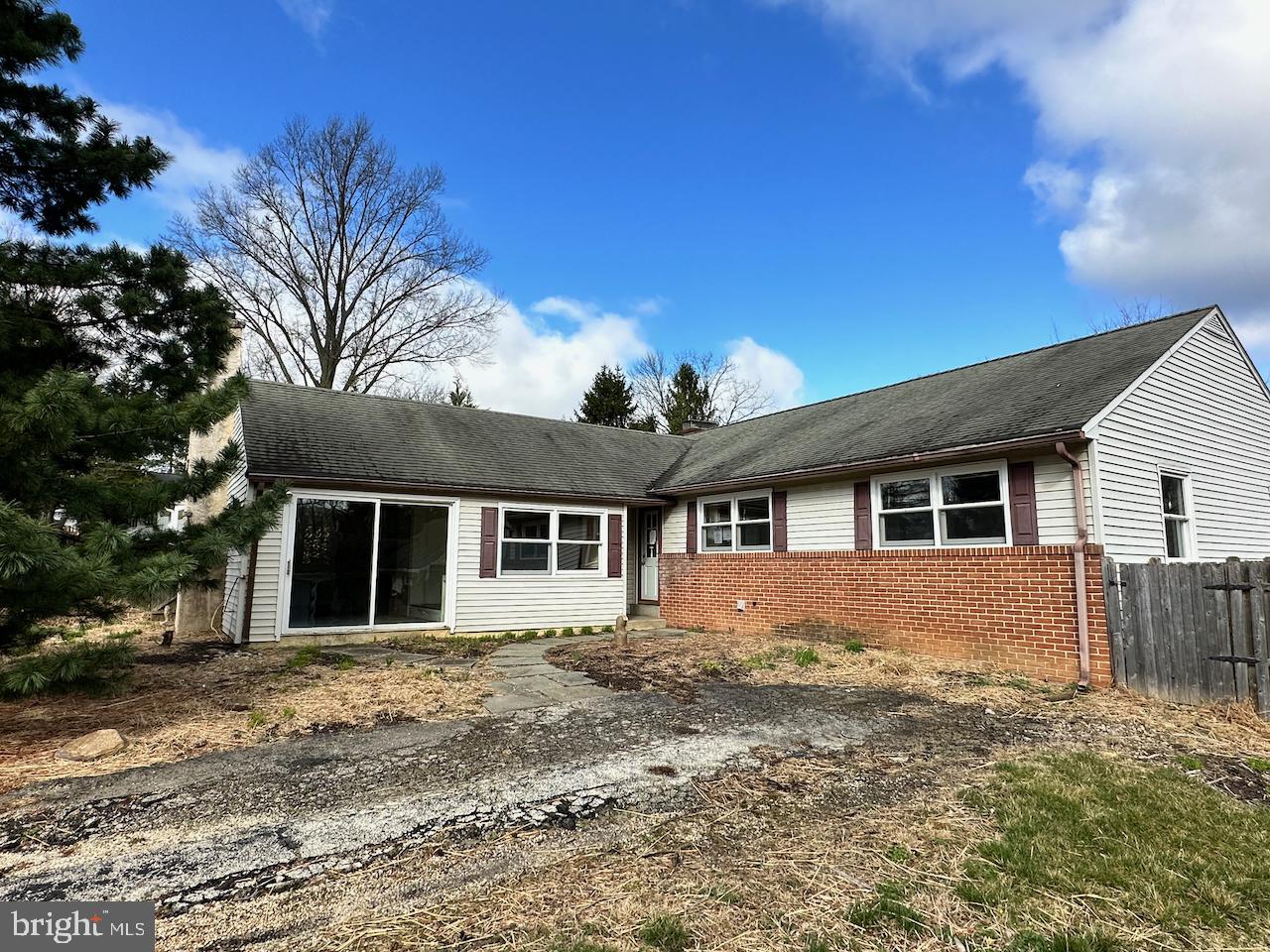 61 Devon Road Paoli, PA 19301 - Photo 1 of 25 a house that has a tree in front of it