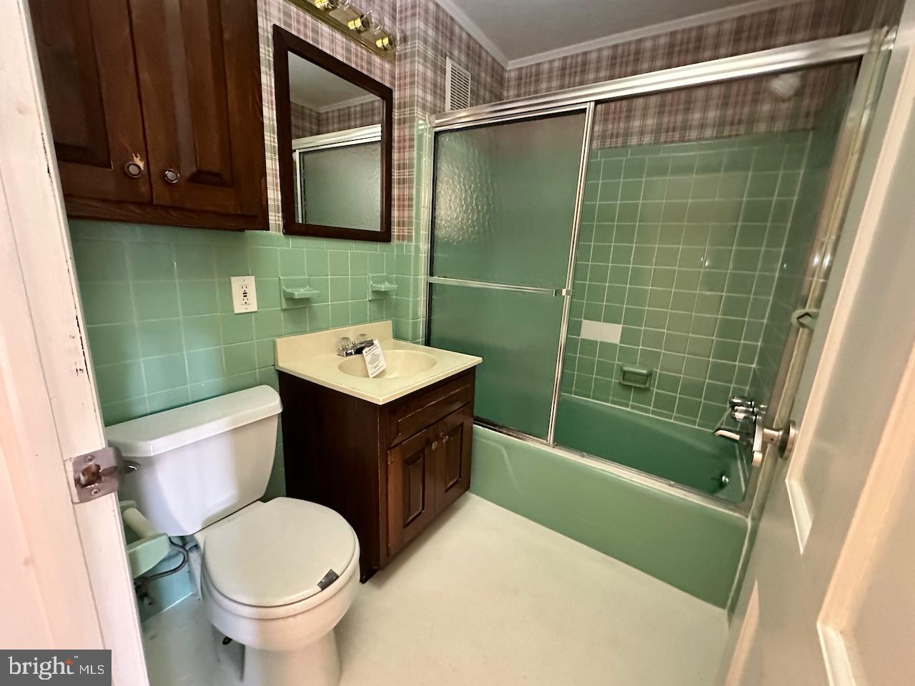 61 Devon Road Paoli, PA 19301 - Photo 13 of 25 a bathroom with a sink toilet and shower