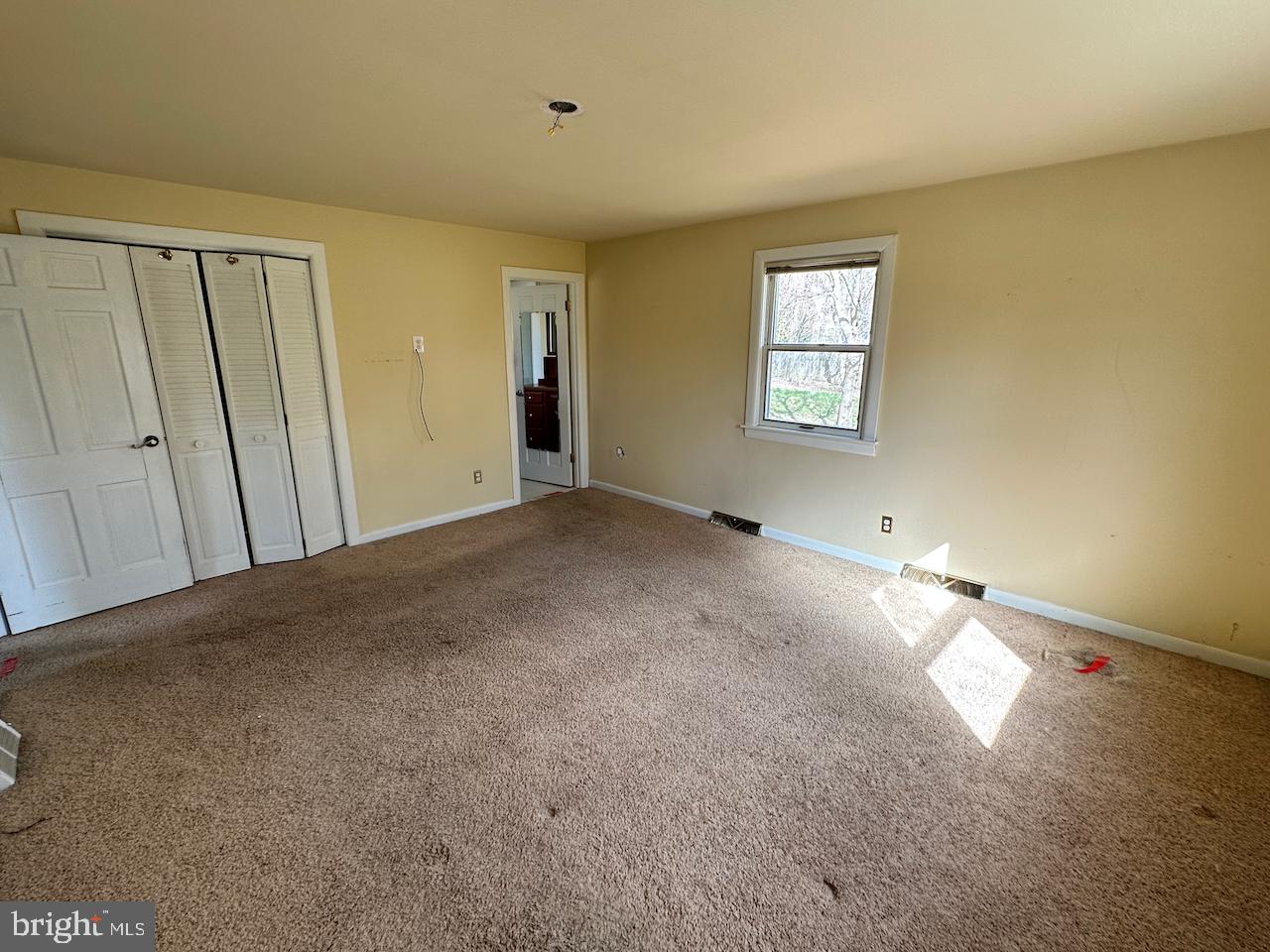 61 Devon Road Paoli, PA 19301 - Photo 16 of 25 a view of an empty room and window