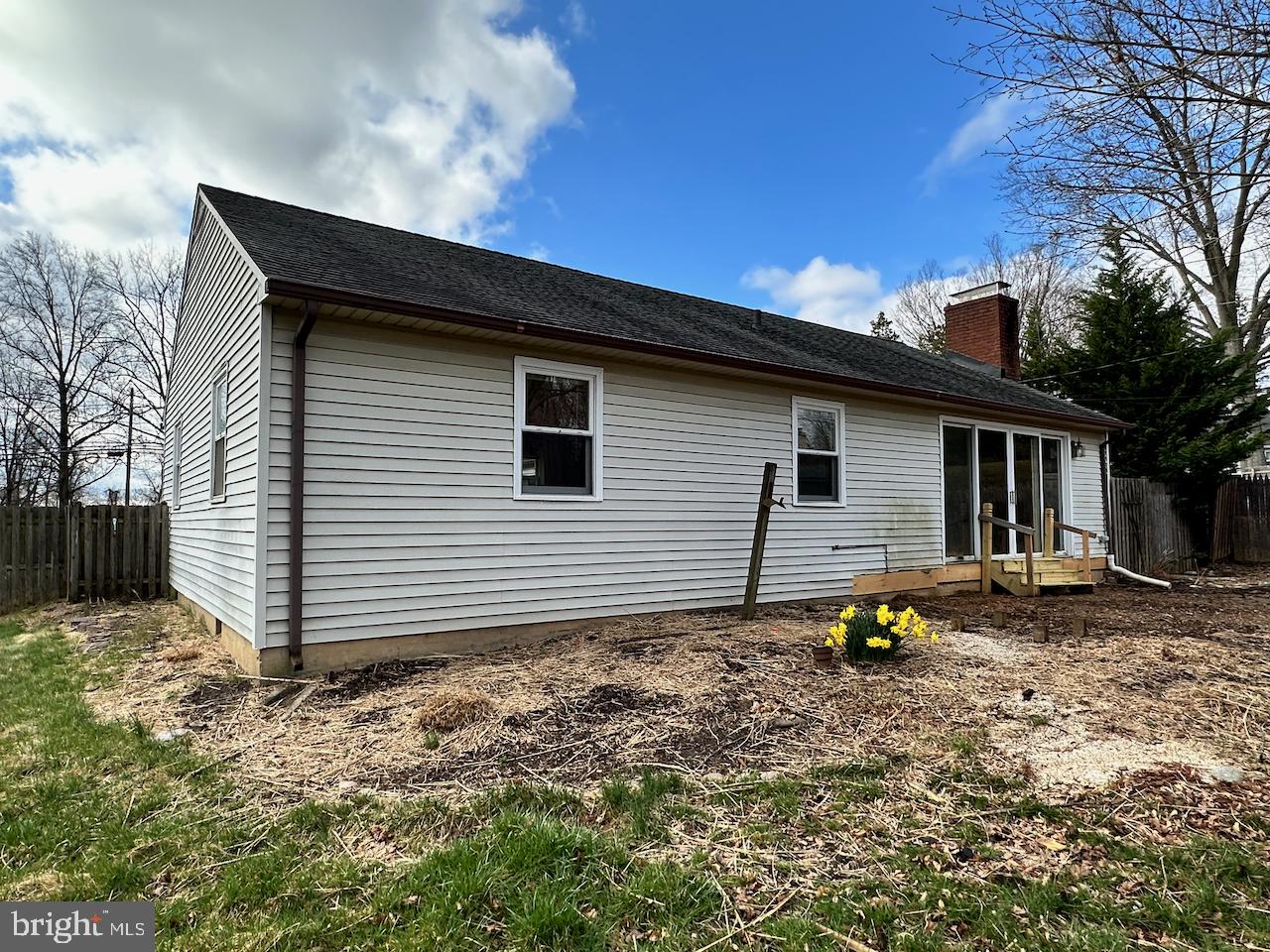 61 Devon Road Paoli, PA 19301 - Photo 25 of 25 a backyard of a house with barbeque oven table and chairs