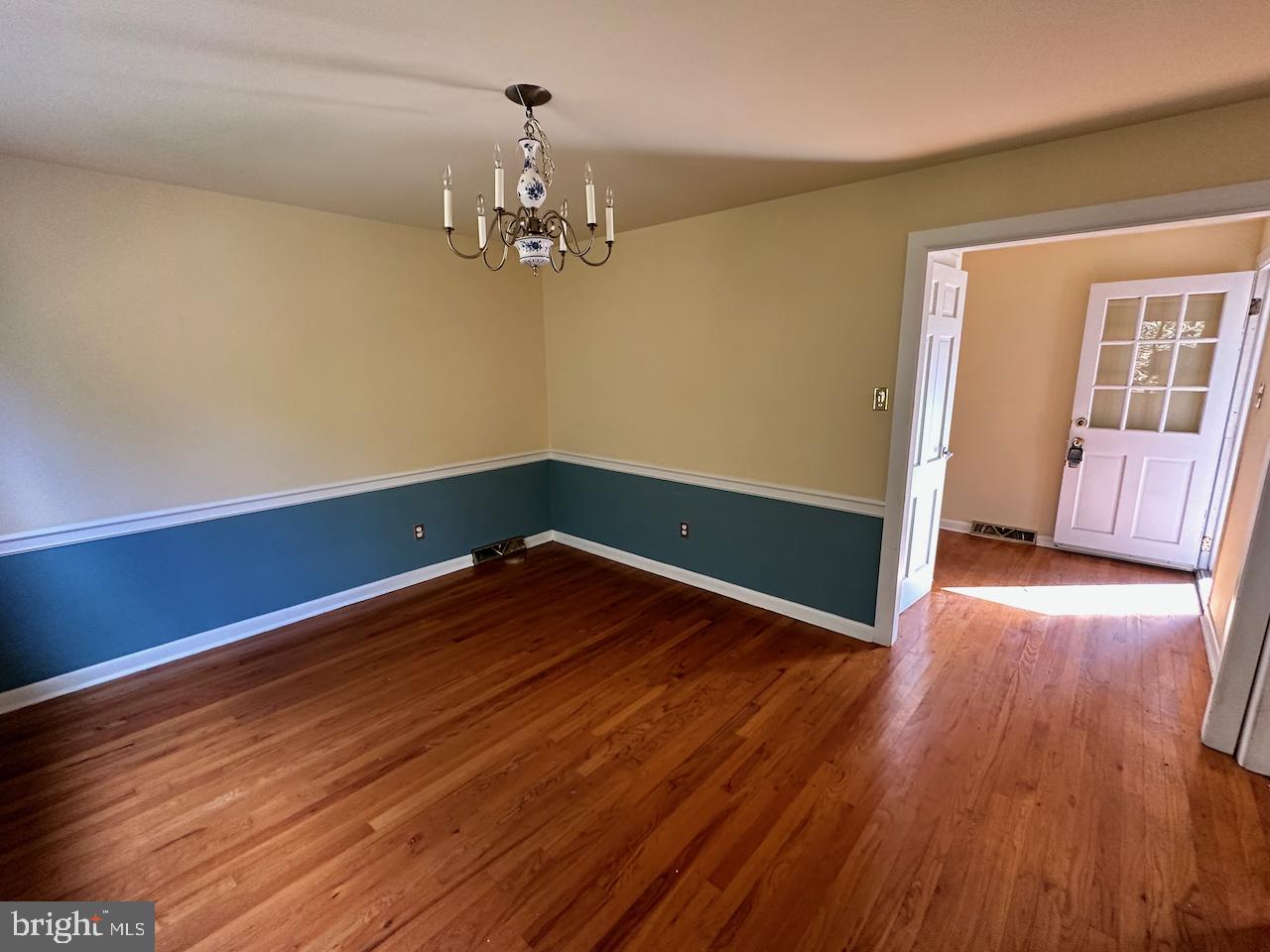 61 Devon Road Paoli, PA 19301 - Photo 10 of 25 wooden floor in an empty room with a window
