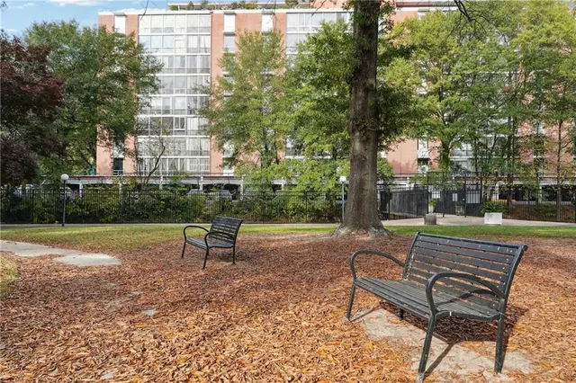 a front view of a house having garden