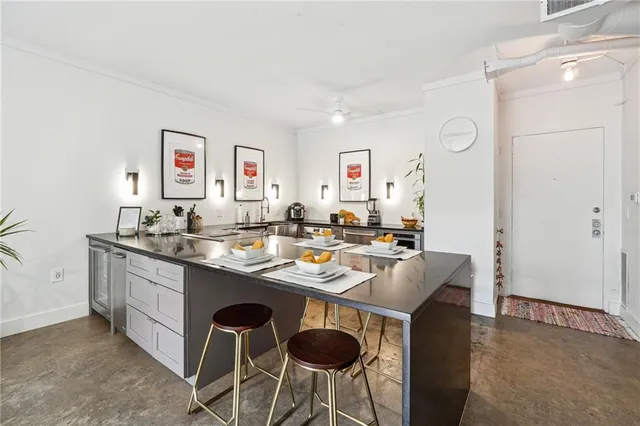 a view of living room with granite countertop furniture and a sink