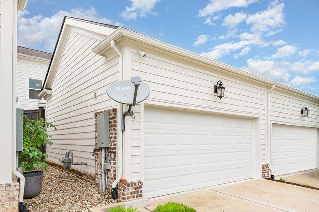 a picture of a bench in front of a building