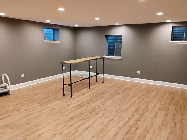a view of a livingroom with wooden floor