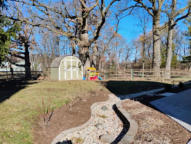 a view of swimming pool with a trees