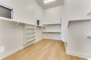 a view of a room with storage and racks