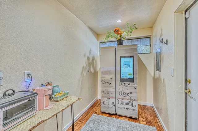 a backyard of a house with outdoor seating