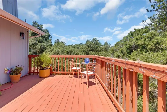 a view of a chairs and table on the wooden floor