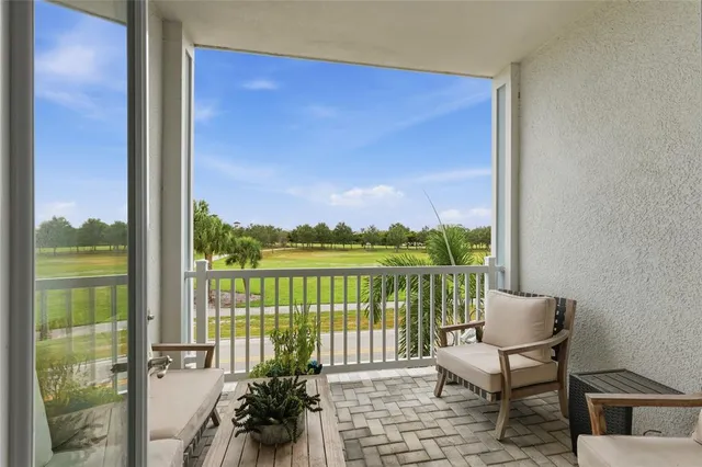a bedroom with furniture and flat screen tv