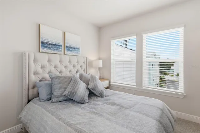 an aerial view of a city with ocean view